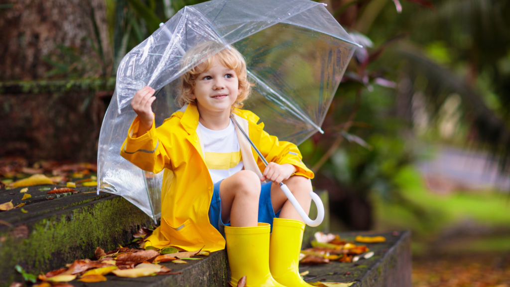 Barn i regnvejr 